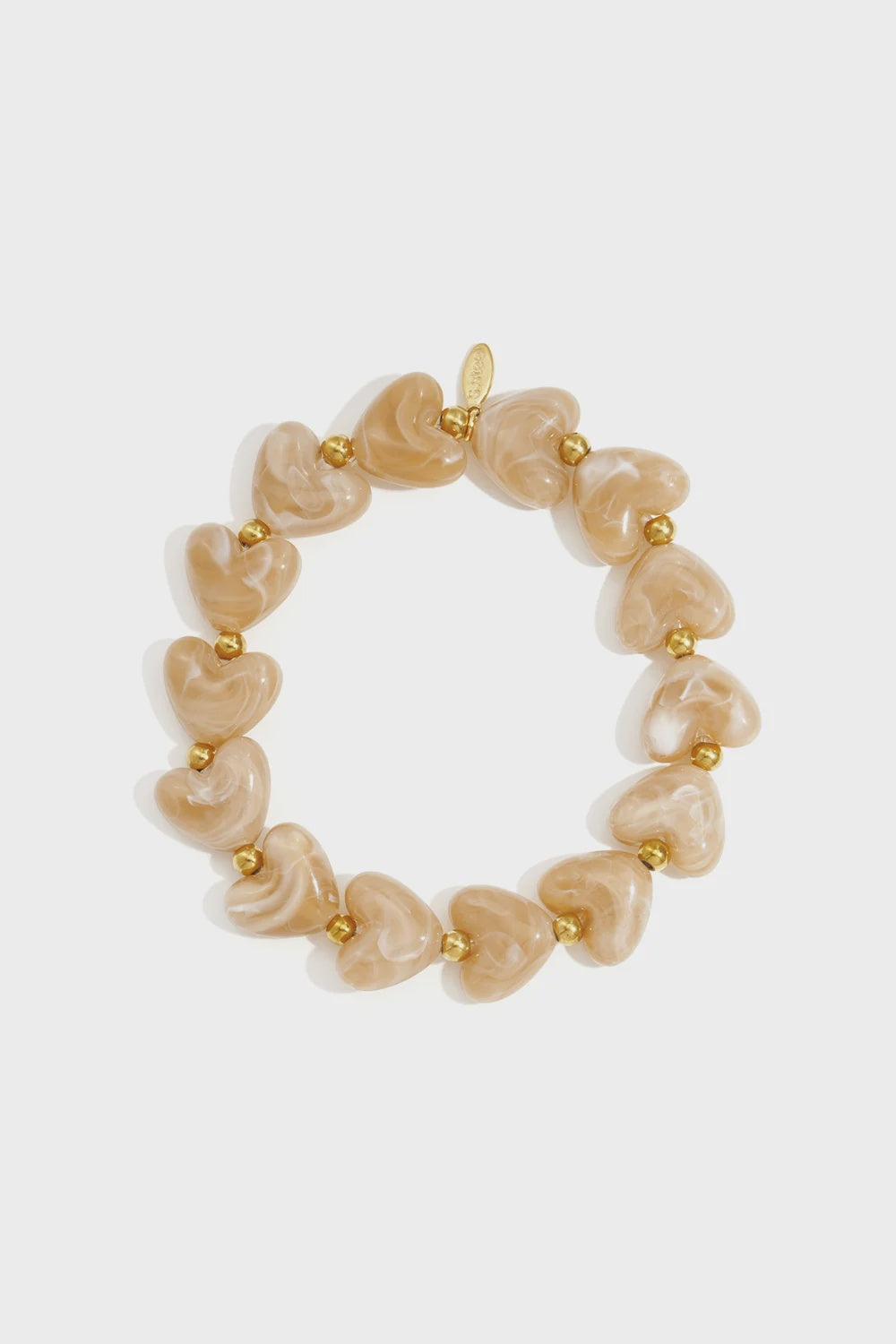 Elastieken hartjes kralenarmband ivoor